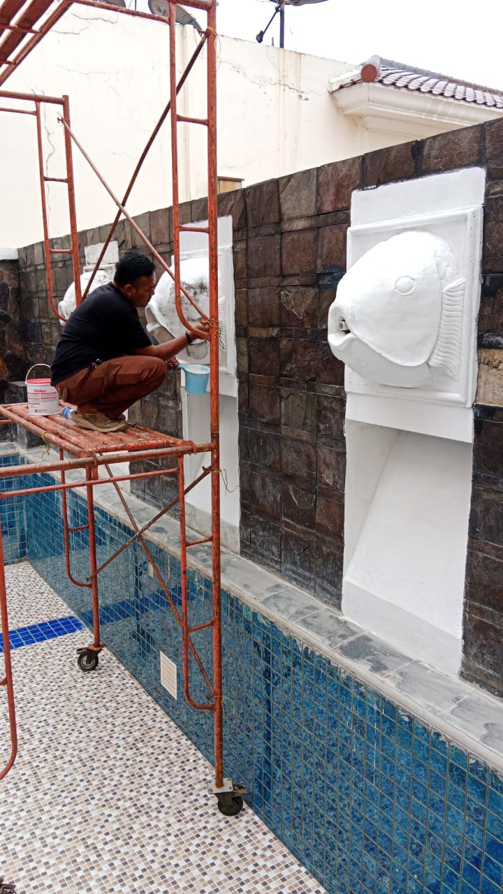 Pengecatan ulang ornament Kepala Ikan